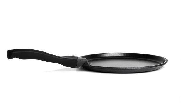 Black frying pancake pan isolated on white.