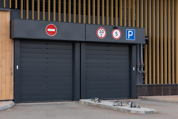 Black gate to enter the underground parking