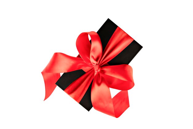 black gift box with red ribbon isolated