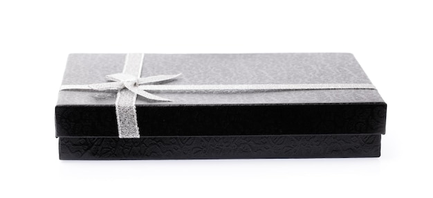 black gift box with white ribbon isolated on white background.