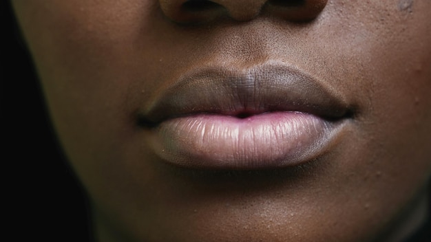 A black girl closeup mouth an african woman face macro