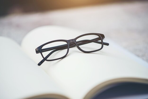 Photo black glasses and book