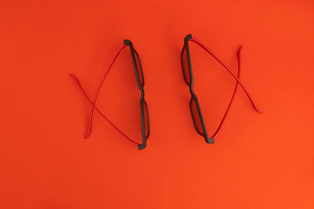 Black glasses with red arcs for the cinema