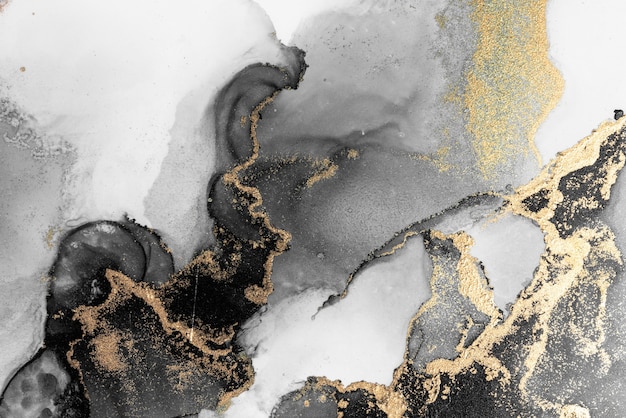 Black gold abstract background of marble liquid ink art painting on paper .