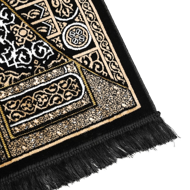 Photo a black and gold rug with a black fringe and a white background