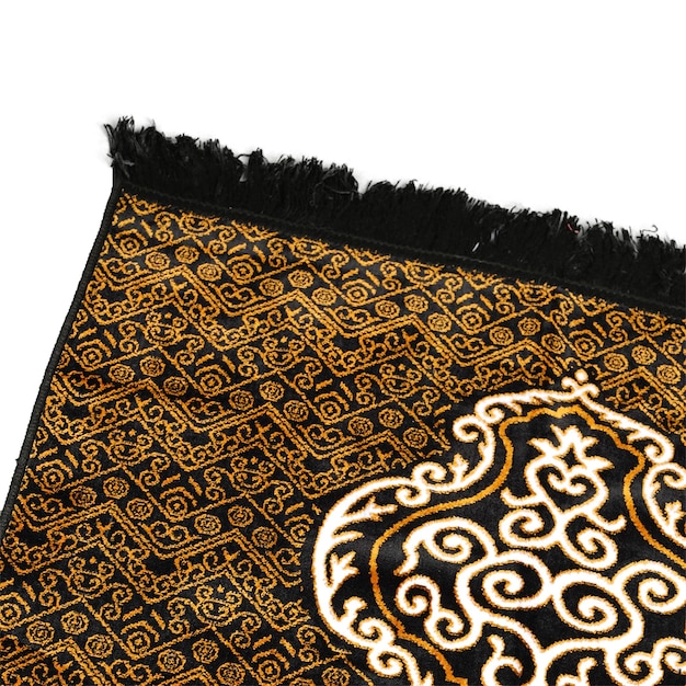 A black and gold rug with a gold design on it