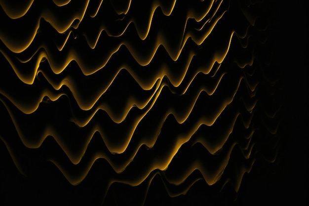 Black and gold waves on a black background