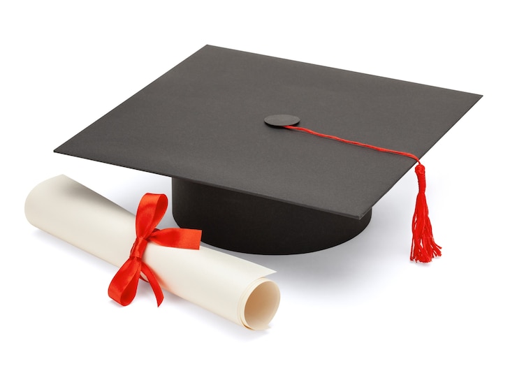 Photo black graduate cap with scientific degree scroll isolated on white background.