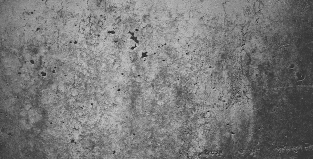 Black grainy stone texture backgroundor dark gray textured background