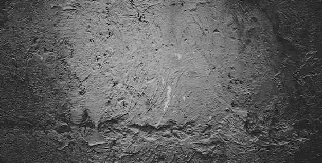 Black grainy stone texture backgroundor dark gray textured background