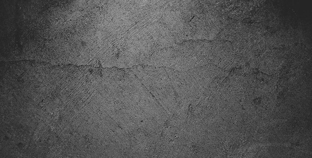 Photo black grainy stone texture backgroundor dark gray textured background