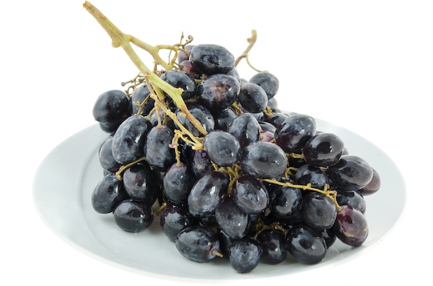 Black  grapes on plate