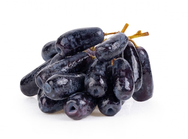 Black grapes with drop of water isolated on white