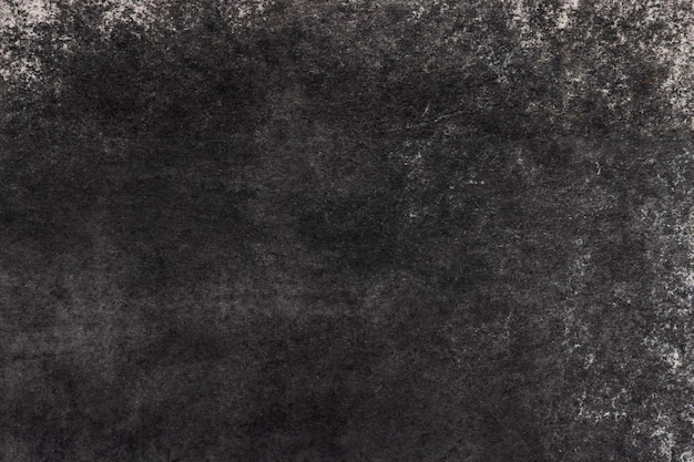 Photo a black and grey textured background with a rough texture