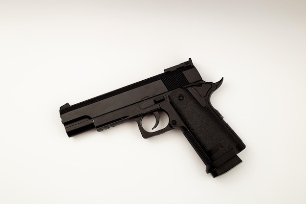 Black gun on white background