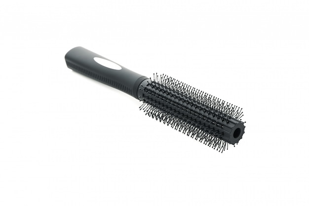 Black hair brush isolated on white