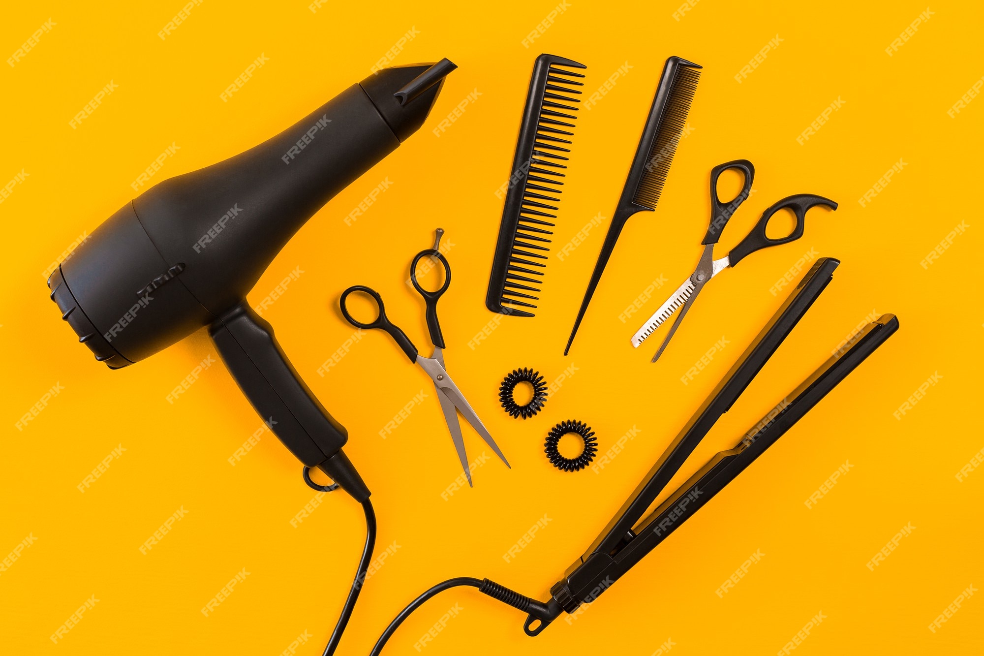 Premium Photo | Black hair dryer, comb and scissors on yellow paper  background. top view. copy space. still life. mock-up. flat lay