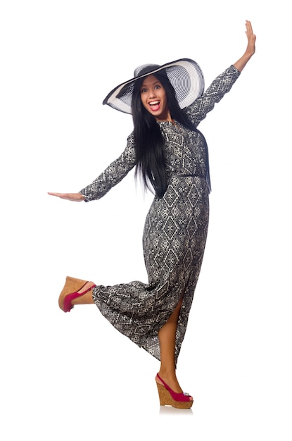 Black hair woman in long gray dress and hat isolated on white