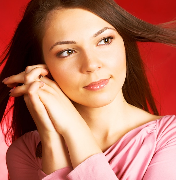 Black hair young woman portrait, studio shot