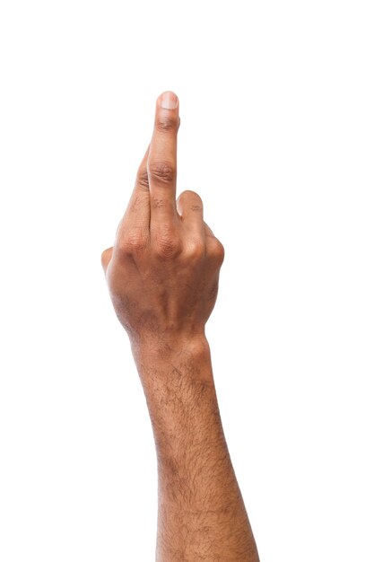 Black hand crossed fingers fo luck, hope, isolated on a white background, closeup