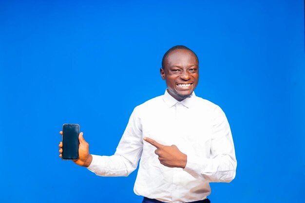 Black Handsome businessman holding and pointing and mobile phone