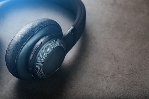 Black headphones on grey