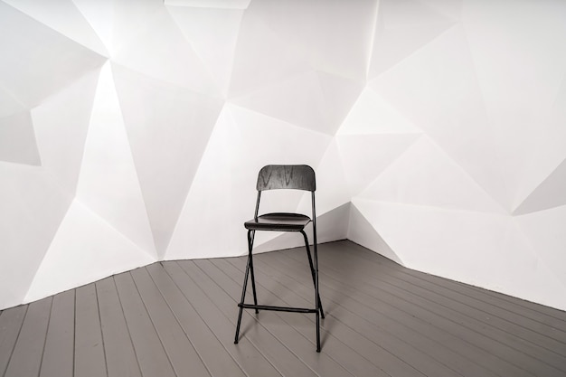 Black high chair on a white