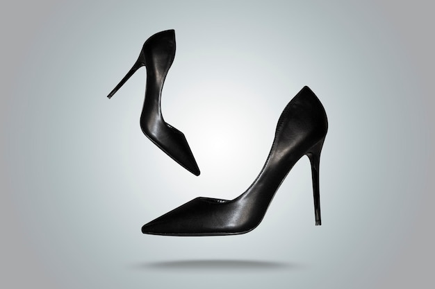 Black high heel  fashion female style isolated on gray background