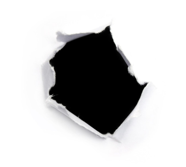 Фото Черная дыра на белой бумаге