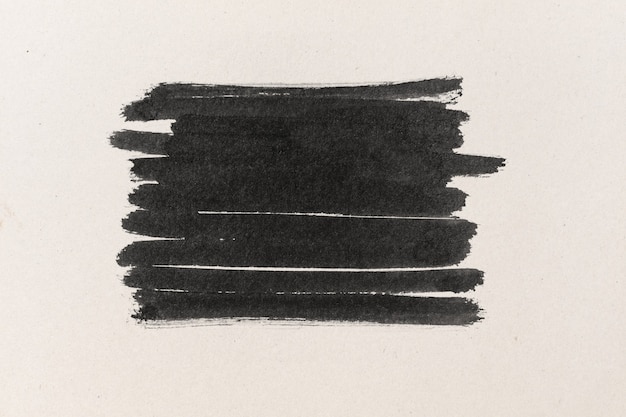水彩紙のテクスチャ背景に黒インクの形
