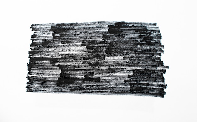Forma di inchiostro nero su texture di carta da acquerello