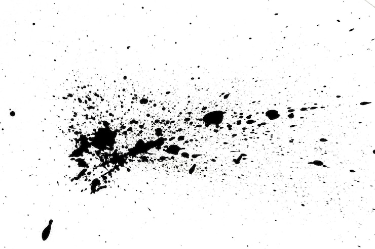 Photo black ink splashes on white background abstract grunge texture