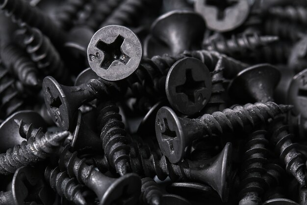 Photo black iron screws background