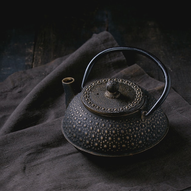 Photo black iron teapot