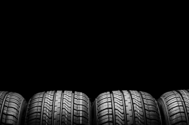 A  black isolation rubber tire, on the black background