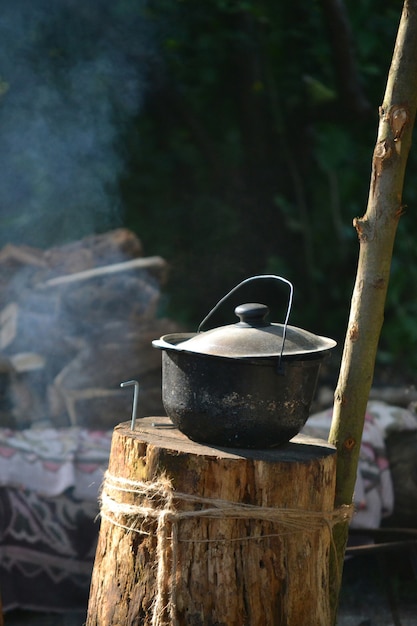 Black kettle pot caldron on the beam