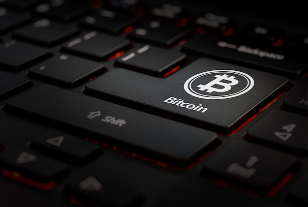 Black keyboard with icon bitcoin