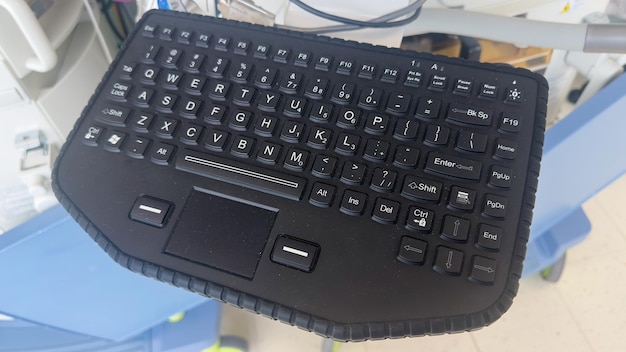 A black keyboard with a white keyboard that says'keyboard '