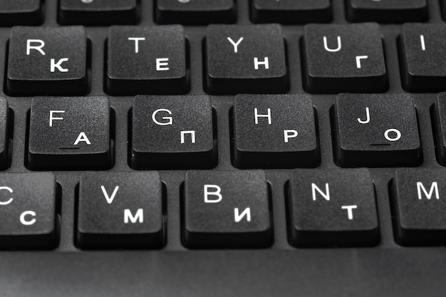 Black laptop keyboard close up