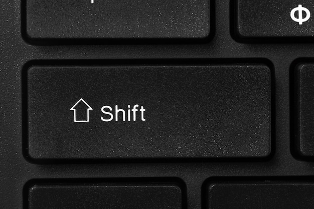 Black laptop keyboard close up