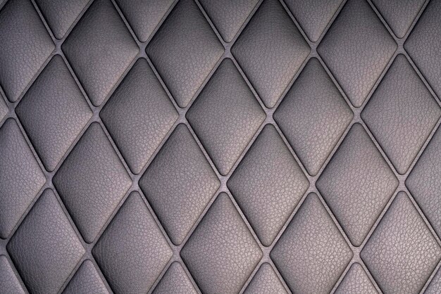 Black leather check pattern interior details of modern luxury\
gaming chair,comfortable leather chair