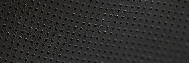 Black leather fabric pattern of small holes wallpaper