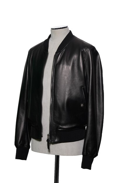 A black leather jacket with a logo on the front.