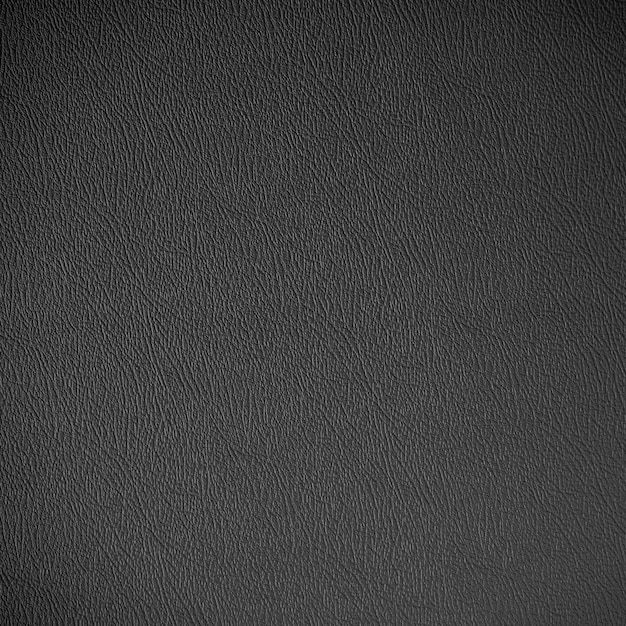 Foto texture in pelle nera con sfondo nero