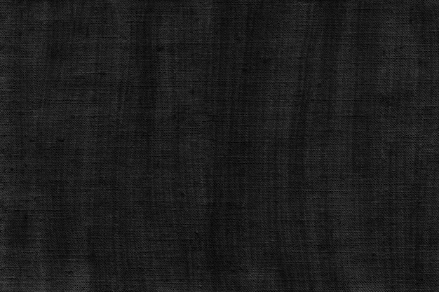 Photo black linen fabric texture as canvas background