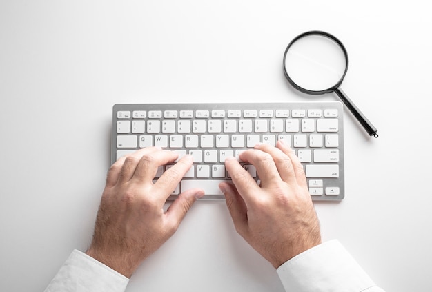 Black magnifier and a white keyboard