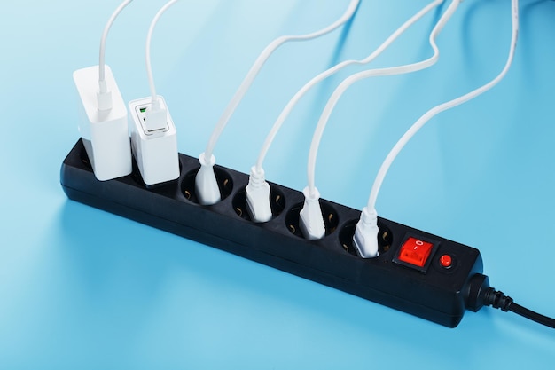 A black mains filter with electrical outlets