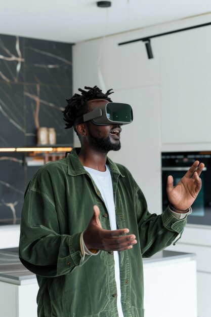 black man in green casual clothes virtual reality glasses gesturing with his hands while standing
