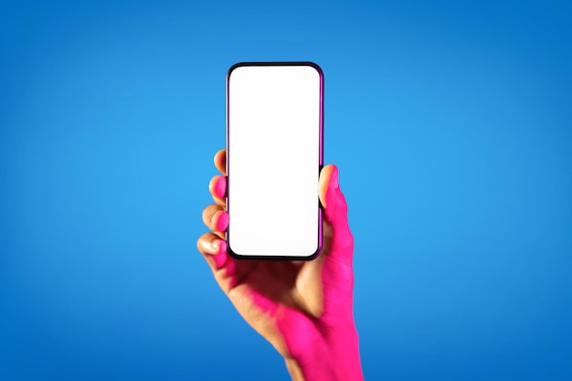 Black man holding smartphone with white empty screen mockup