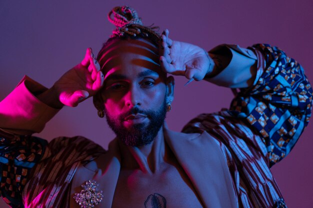 Photo black man in neon studio light